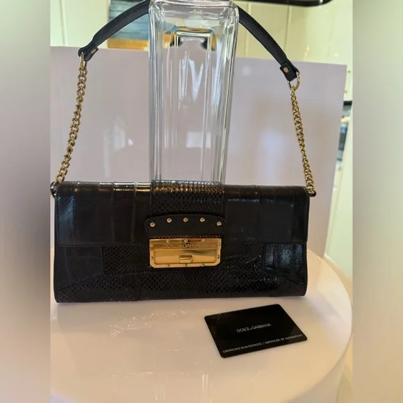 Dolce & Gabbana Black Leather Clutch with Gold Chain and Hardware vintage - Picture 1 of 3